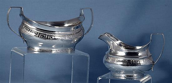 A George III Irish silver sugar bowl and cream jug, maker possibly Robert Breading, bowl length 210mm, weight 12oz/375grms.